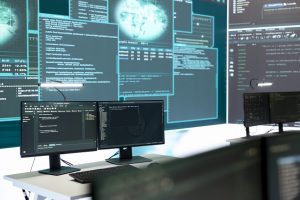 Cyber security monitoring room with high tech equipment. Governmental focus on cyber operations, cyber surveillance, and digital threats protection in an empty command workspace.