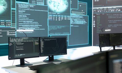 Cyber security monitoring room with high tech equipment. Governmental focus on cyber operations, cyber surveillance, and digital threats protection in an empty command workspace.
